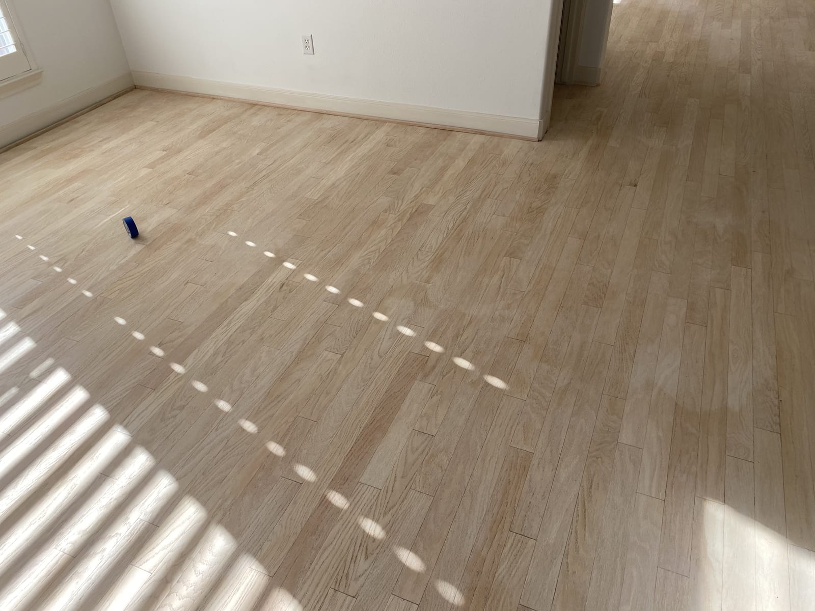 Light wood-look plank in an open floor plan