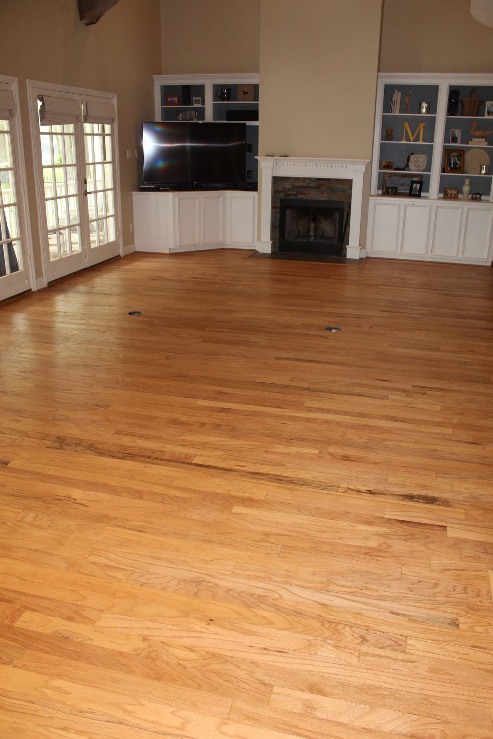 Refinished oak living room with a natural finish