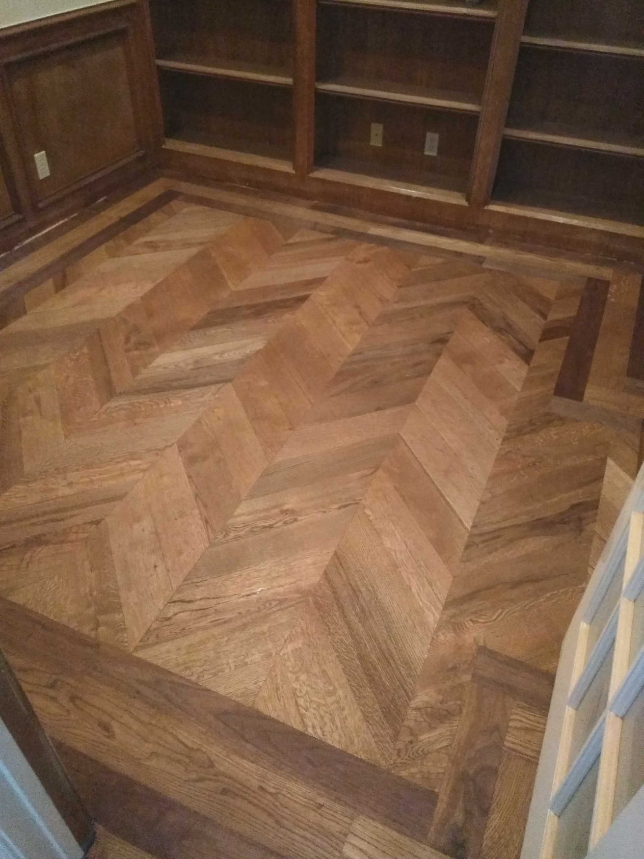 Herringbone hardwood, tight and even