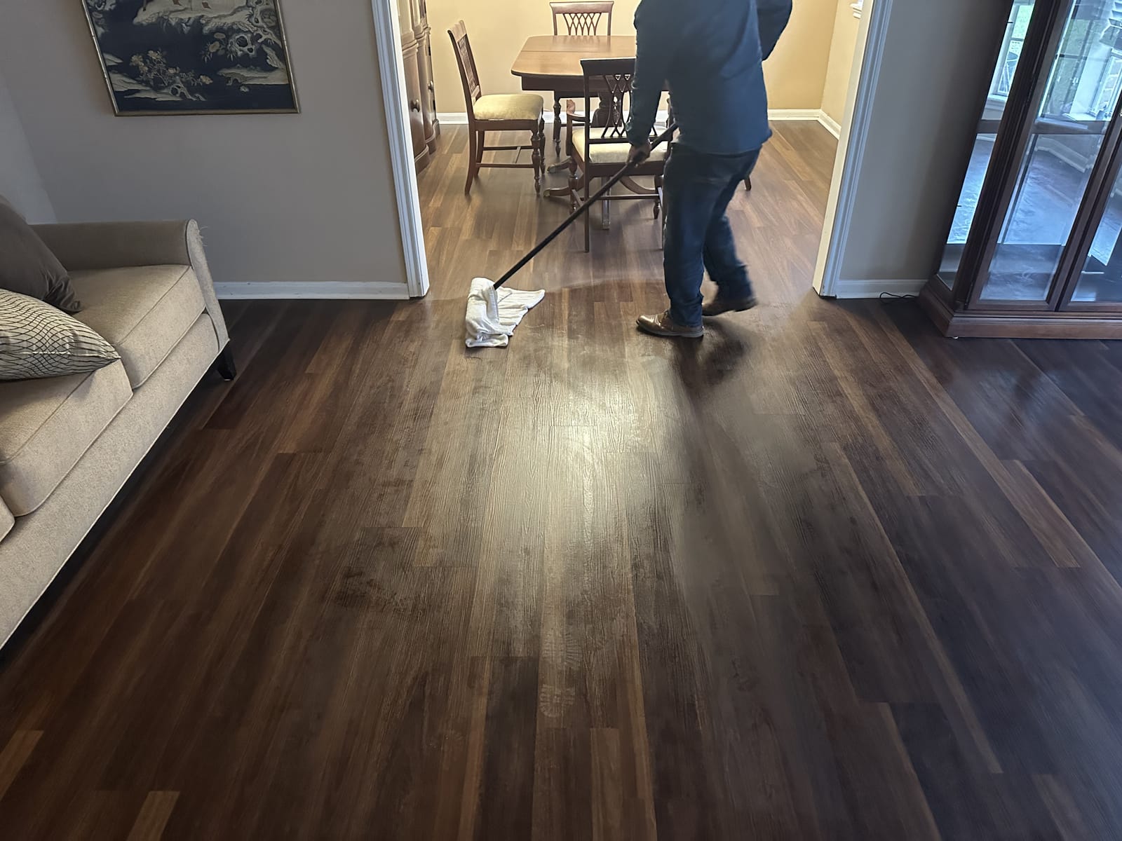 Refinished dark floor on the final clean