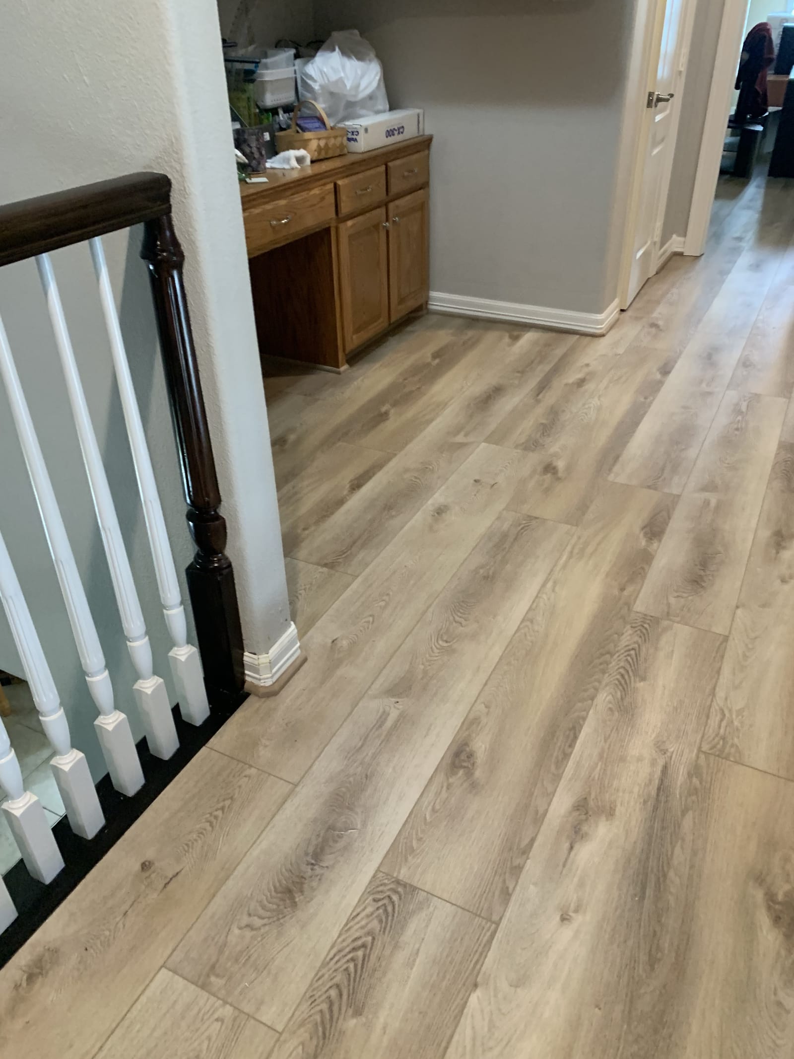 Light plank flowing to the staircase