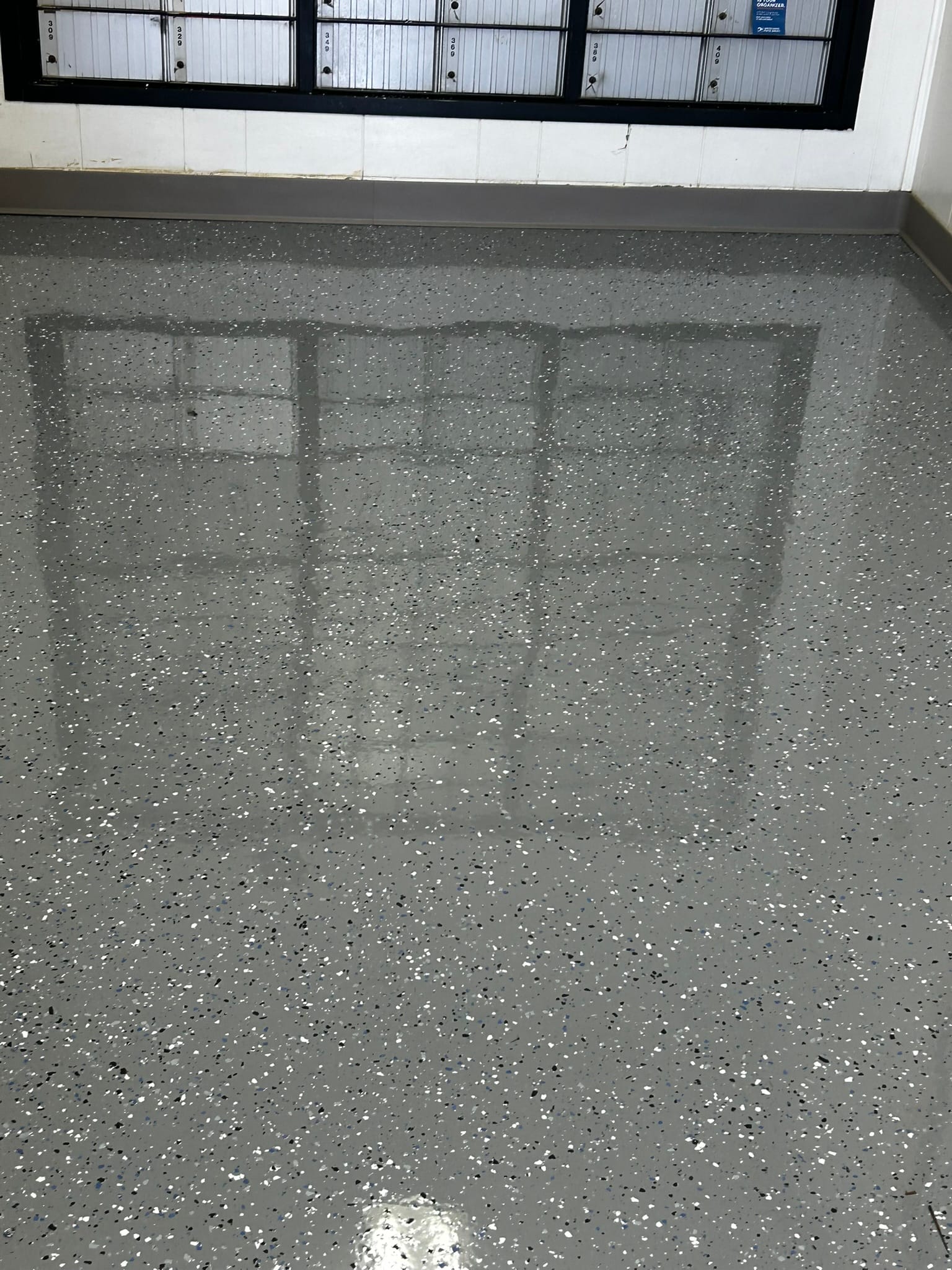 Epoxy flake floor in a postal mailroom